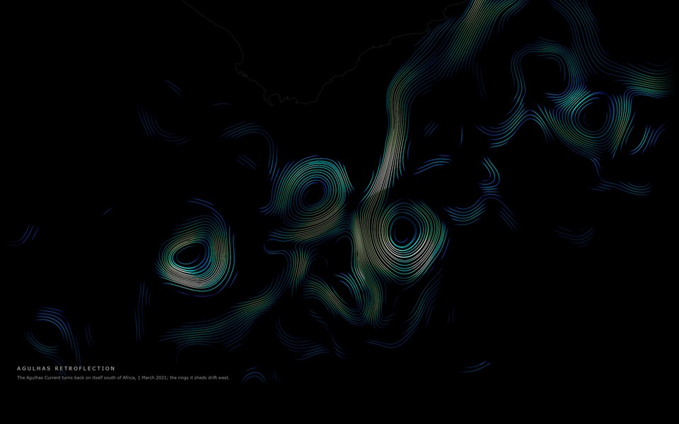 Blue and teal ocean currents curling into spirals